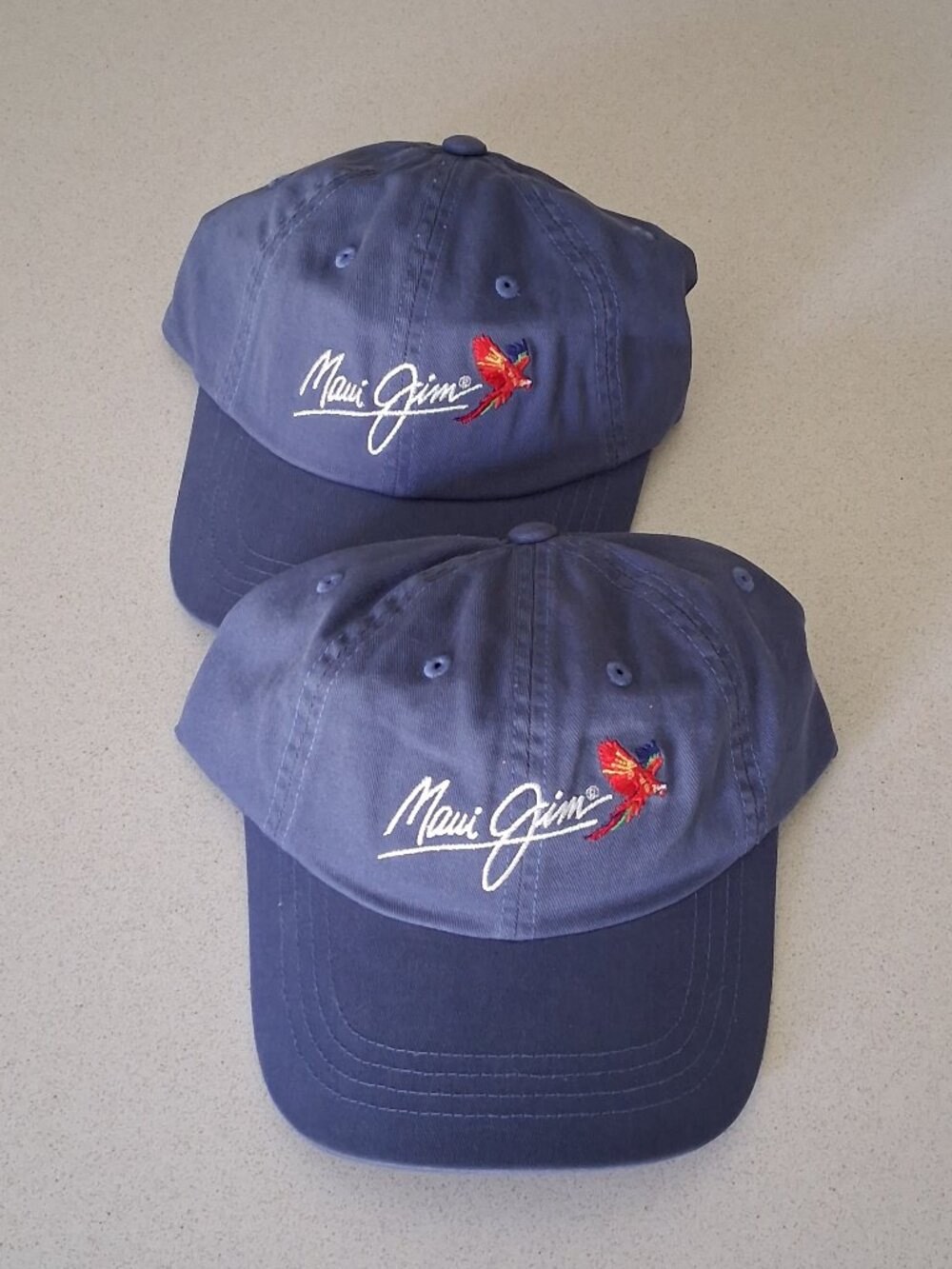 Maui Jim Set of 2 New Blue Back Strap Baseball Caps with Parrot Logo